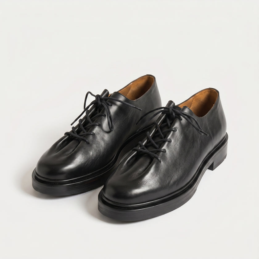 The Pietra Noir Signature Handcrafted Black Leather Contemporary Round-Toe Oxford-Inspired formal shoes for Men