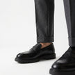 The Verona Handcrafted Leather Black Penny Loafers with Lug Sole for Men