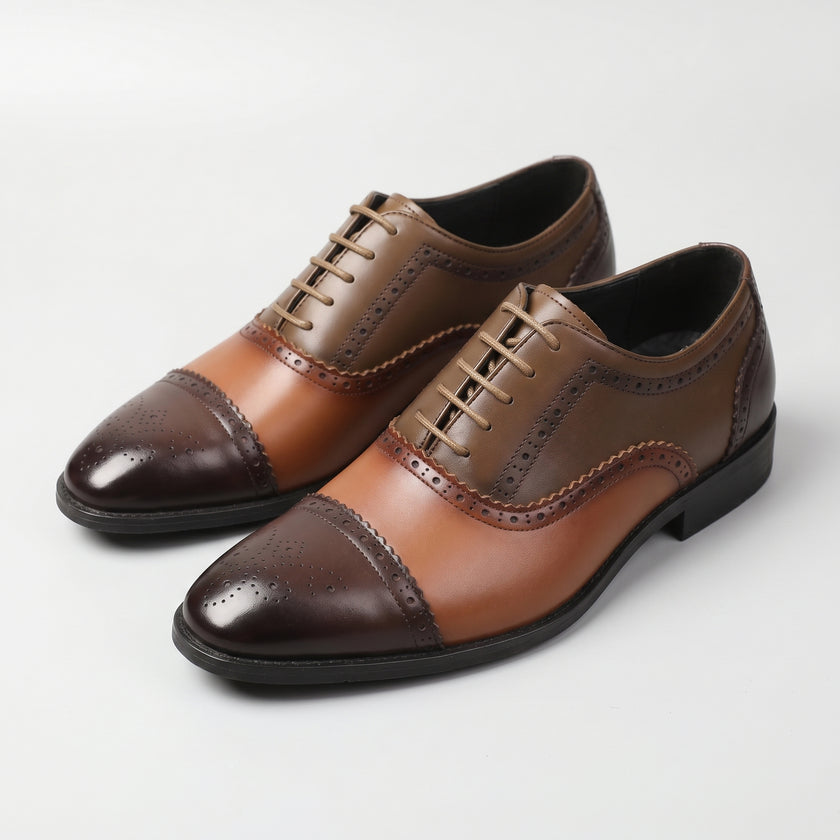 The Rosso Handcrafted Dual tone Oxfords with cap toe and brogue detailing for Men