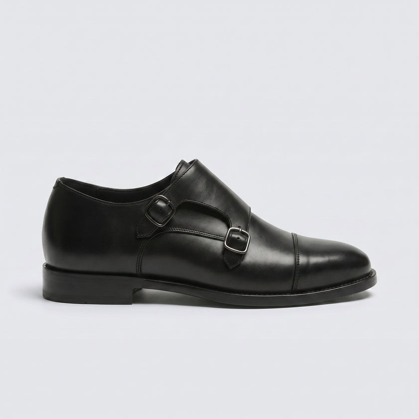 The Maison Noir Handcrafted Leather Double Monk Straps with Buckle Detailing and a Sleek Cap-Toe Silhouette for Men