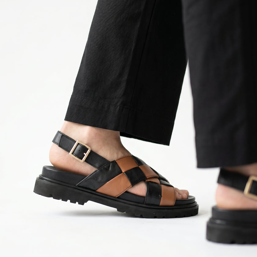 The Olmo Hnandcrafted Black & Tan Woven Leather Slingback Sandals with Rugged Lug Sole for Men