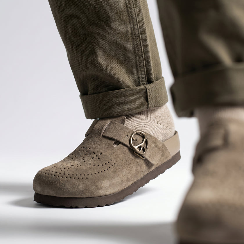 The Montavio Handcrafted Grey Suede Finish Brogue-Inspired Perforation Signature Buckle Strap Textured Comfort Sole Slip-Ons for Men