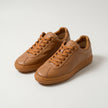 The Aurelio Hancrafted Caramel Leather Low-Top Sneakers Refined Everyday Footwear with Contemporary Appeal