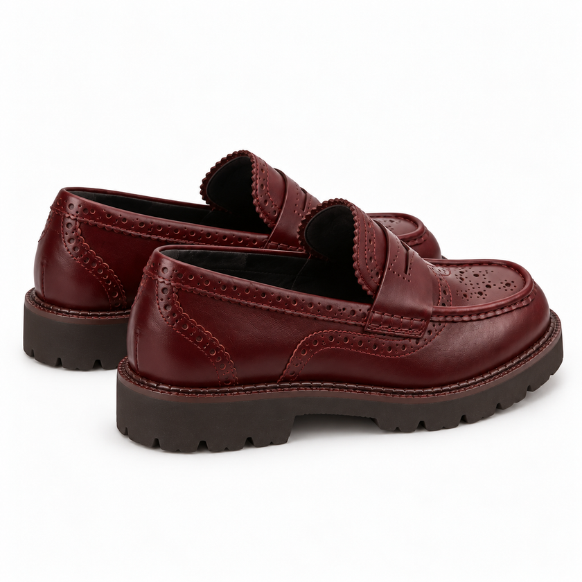 The Valenor Handcrafted Burgundy Leather Brogue Detailing, Refined Moc-Toe Silhouette & Polished Heritage Finish Penny Loafers