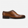 The Aurelius Milano Handcrafted Leather Wingtip Oxford Shoes for Men with Refined Brogue Detailing and Rich Cognac Patina