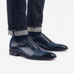 The Oxford Royale Midnight Navy Leather Dress Shoes with Textured Embossed Lace Panels, Handcrafted Cross Stitch Detailing and Refined Executive Styling for Men