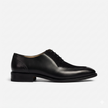 The Milano Prestige Black Leather Oxfords with Refined Brogue Perforations, Elegant Lace Up Styling and Classic Leather Sole for Men