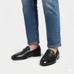 The Milano Prestige Handcrafted Black Leather Loafers with Intricate Woven Vamp Detailing and Elegant Gold Buckle Accents for Men