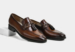 The Valenza Handcrafted Dark Brown Leather Tassel Loafers with buckle detailing for Men