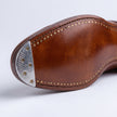 Laser Sole Engraving on Metal toe taps for subtle personalization - MORDA MILANO